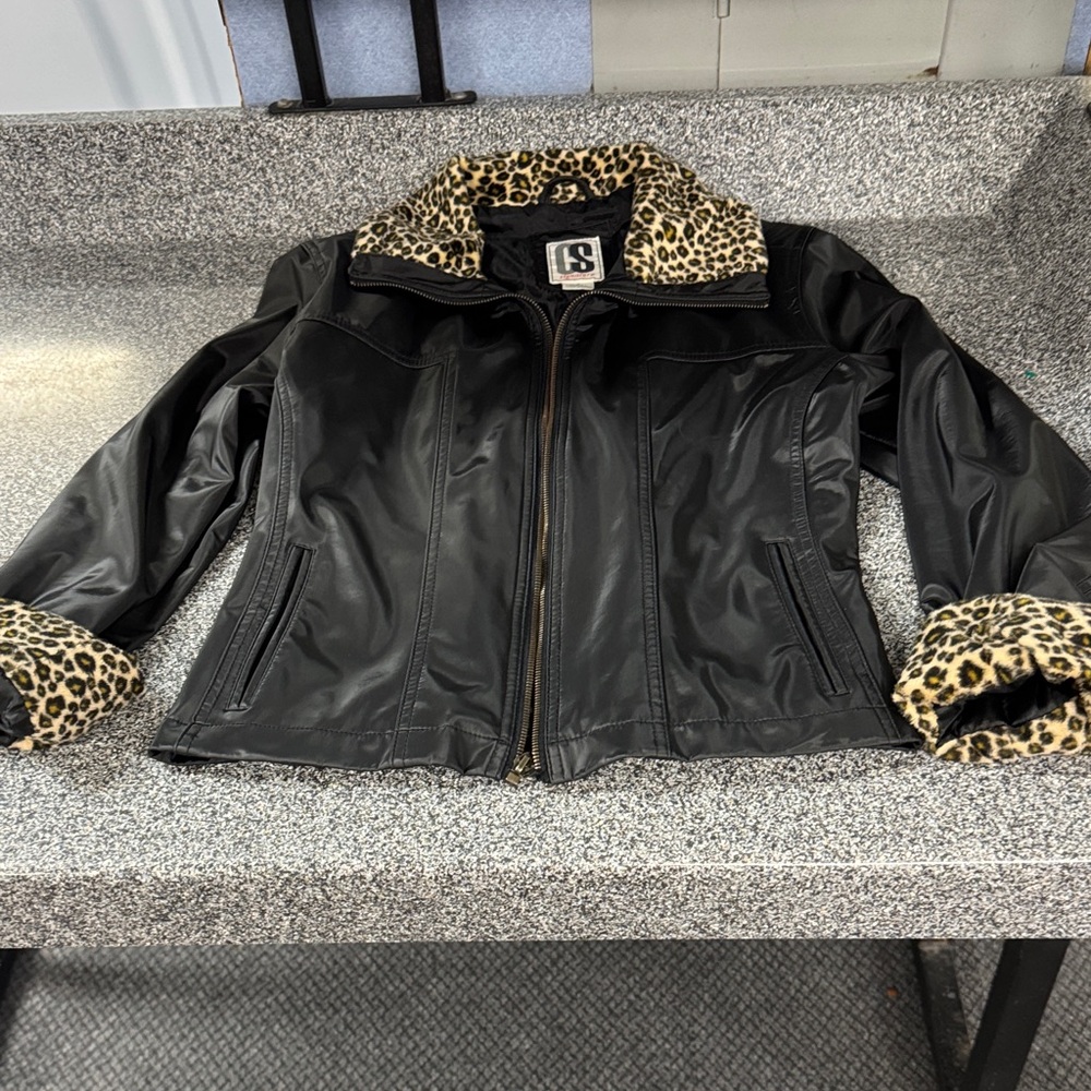 Signature Black Leather Jacket with Animal Print Details